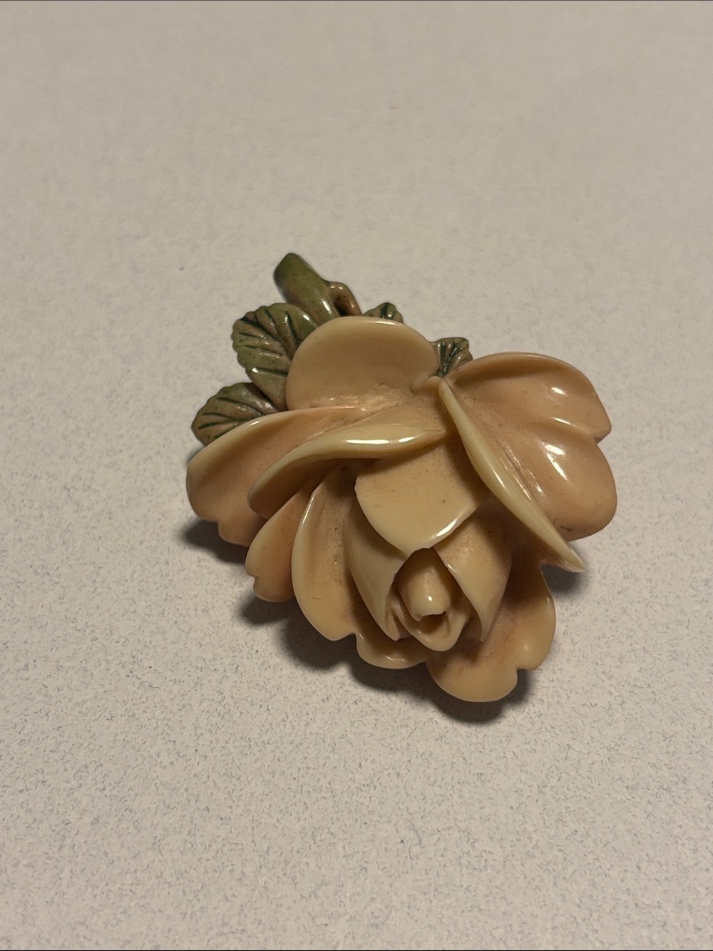 Vintage celluloid carved rose brooch